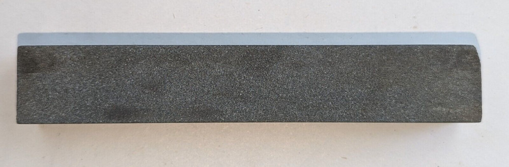 Vintage sharpening stone maybe natural stone , used