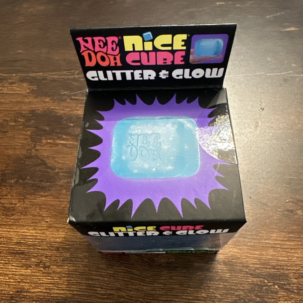 The Needoh Nice Cube Glitter & Glow BLUE, Super Solid Squish Ball