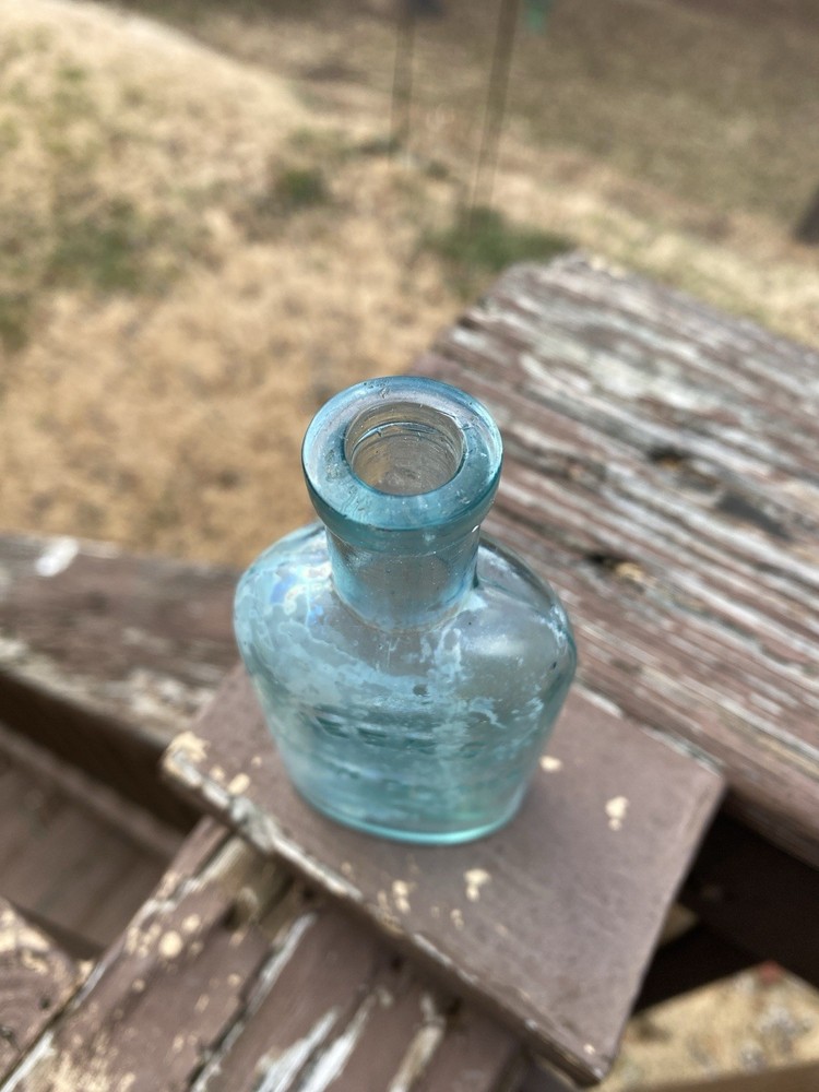 Week’s Snow Flake Blue Antique Bottle