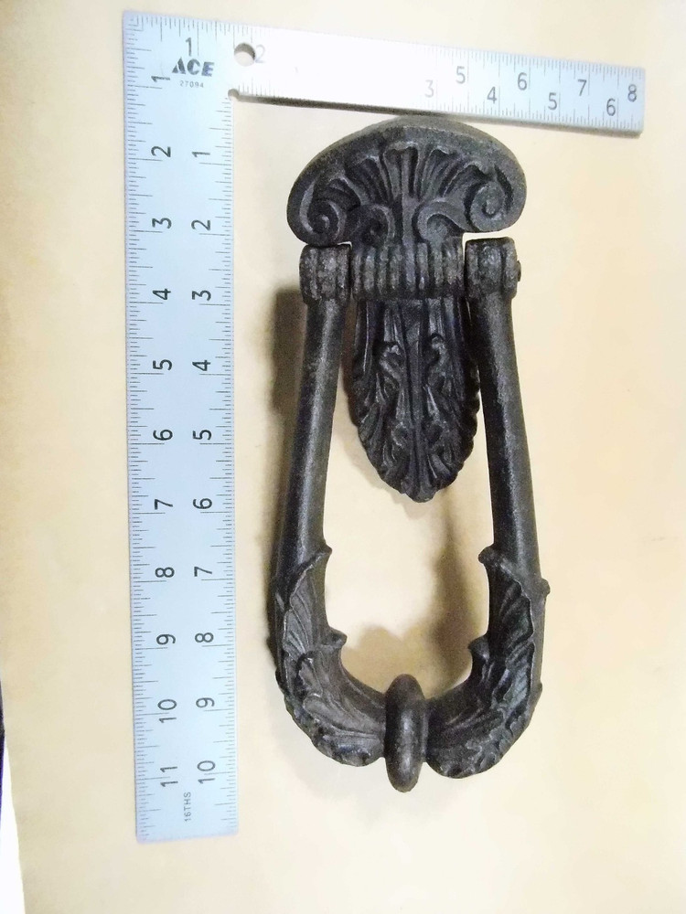 Antique entry door knocker cast iron
