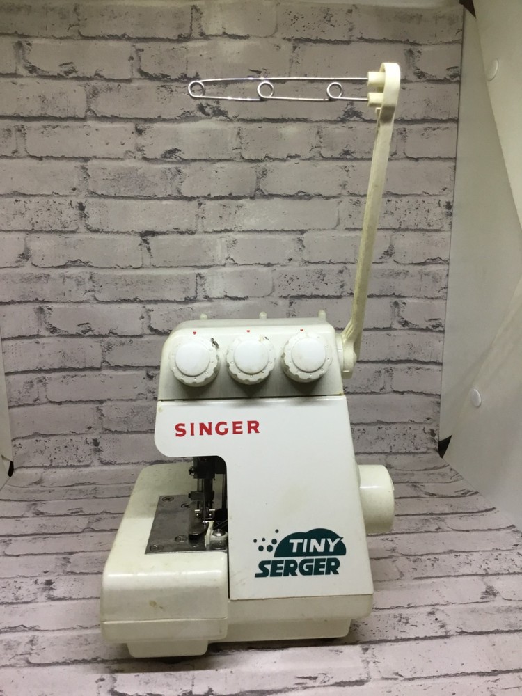 singer tiny serger ts380 plus parts only no cords untested
