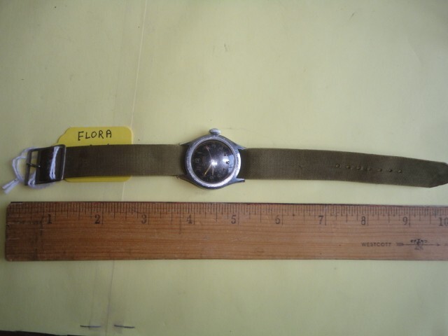 G.I. WRISTWATCH, RUNS WELL,  FLORA BRAND