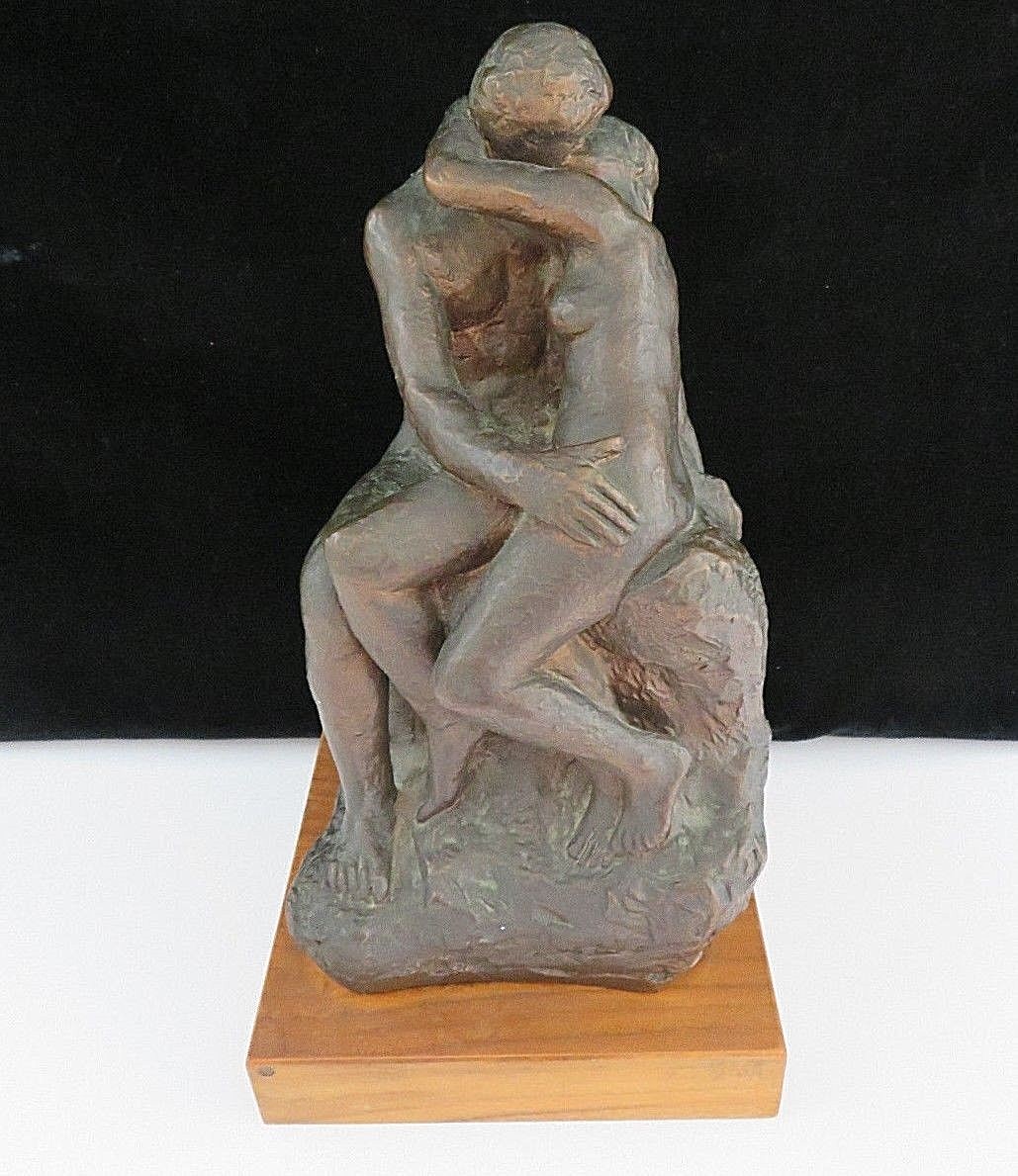 The Kiss Molded Statue on Wood Base