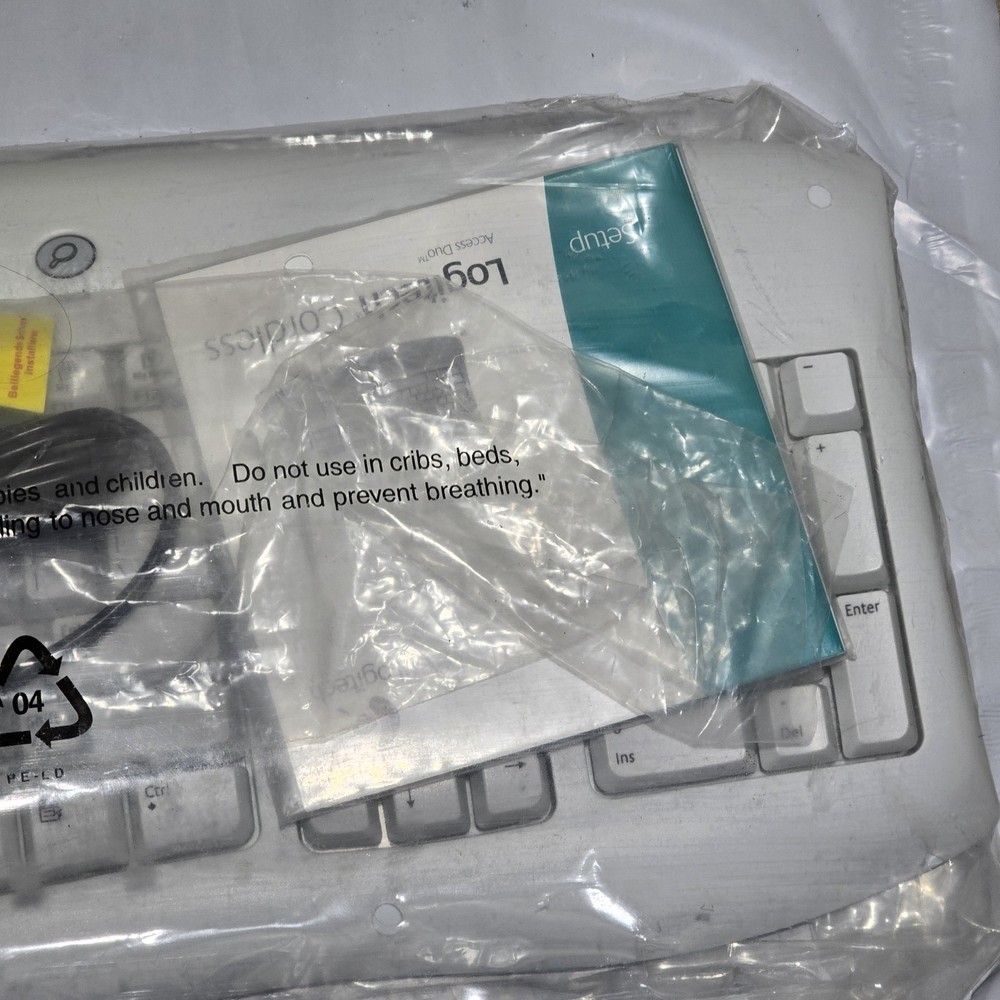 Logitech cordless Access Duo, keyboard and mouse.