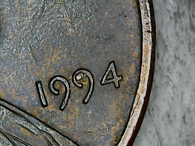 1994 Lincoln Cent . Die chip on Date.