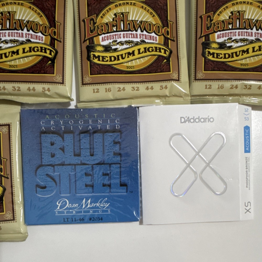 Acoustic guitar string lot - 18 sets - sealed packages