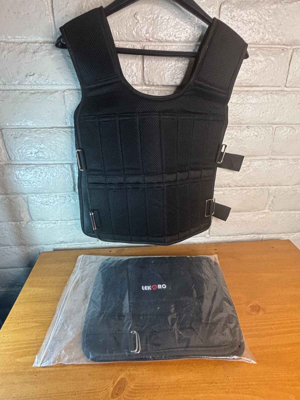 Lekaro Adjustable Weighted Vest and Pair of Leggings WITHOUT Weights Never Used