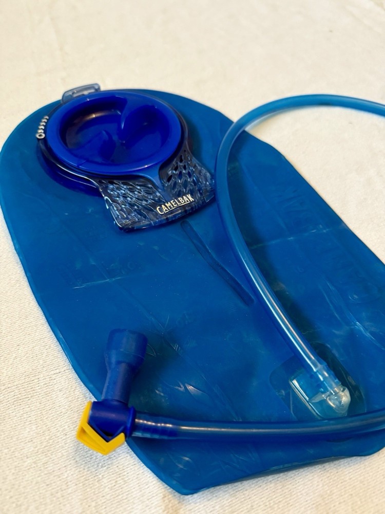 Camelbak M.U.L.E. Hydration Backpack Black/Red With Water Bladder 70oz.