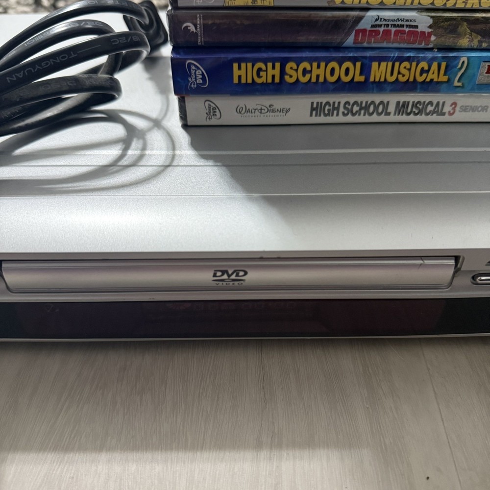 Koss DVD / CD / MP3 Player KD365 with Sealed DVD Bundle