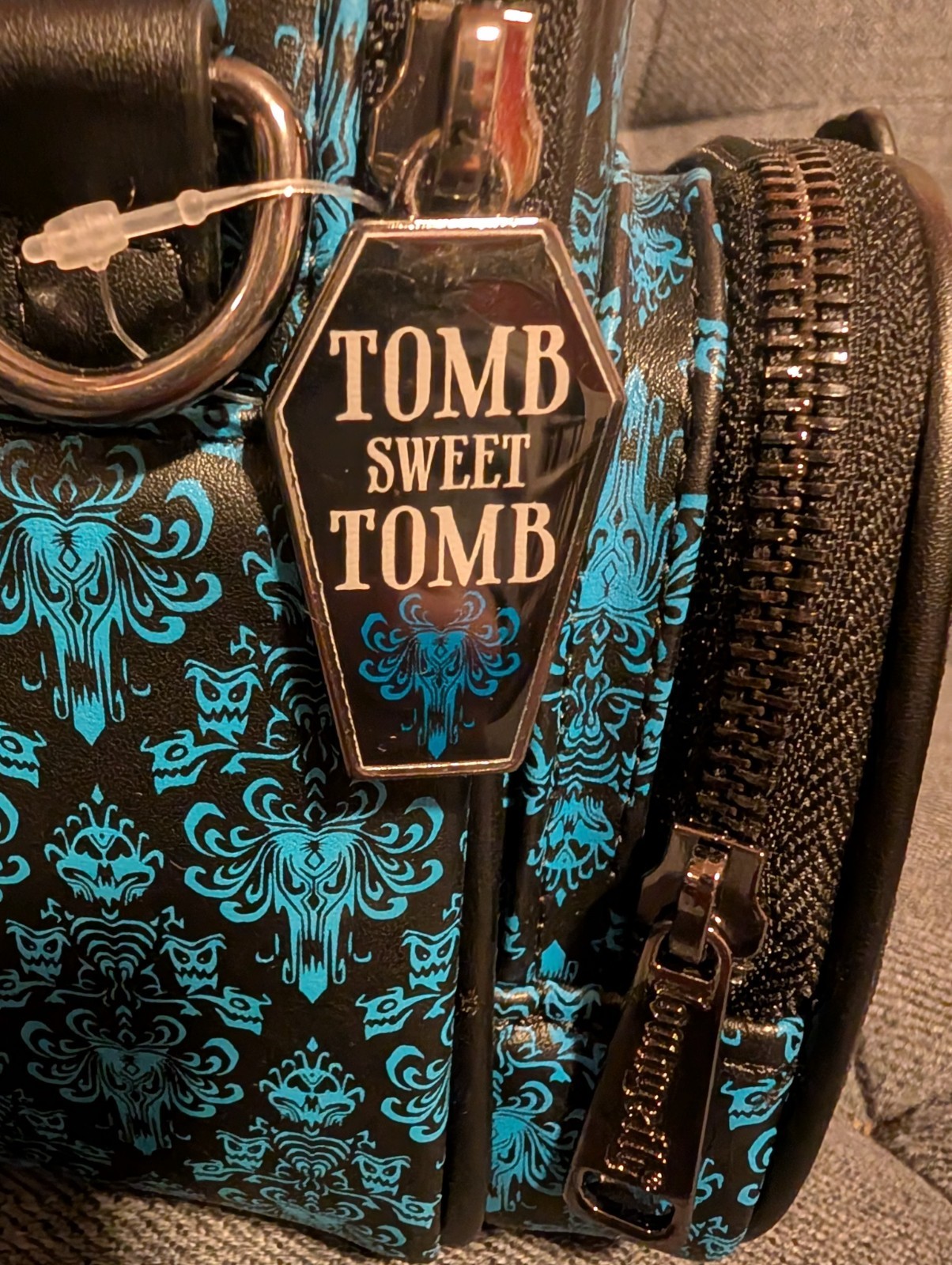 Loungefly Disney Haunted Mansion Hitchhiking Ghosts Convertible Glow Backpack