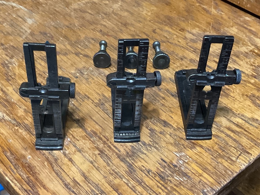 Remington 1903 sight base, leaf, slide, elevation, windage knobs marked R. 1 set