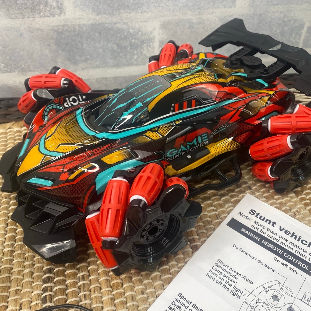 NEW Multi-Function GoolRC Stunt Car, Remote Control 2 remotes Lights music water