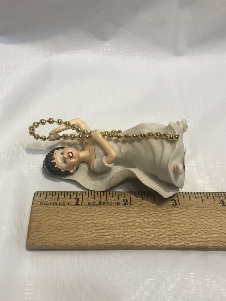 A Decorative Ceiling Fan Or Light Pull Ball Chain With Bride