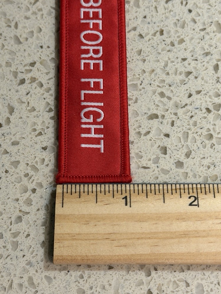 Pre-Owned Red SpaceX Falcon 9 Rocket Remove Before Flight Keychain Zipper Pull