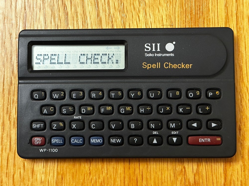 Seiko Instruments SII Spell Checker WP 1100 - with Case and Instructions (1992)