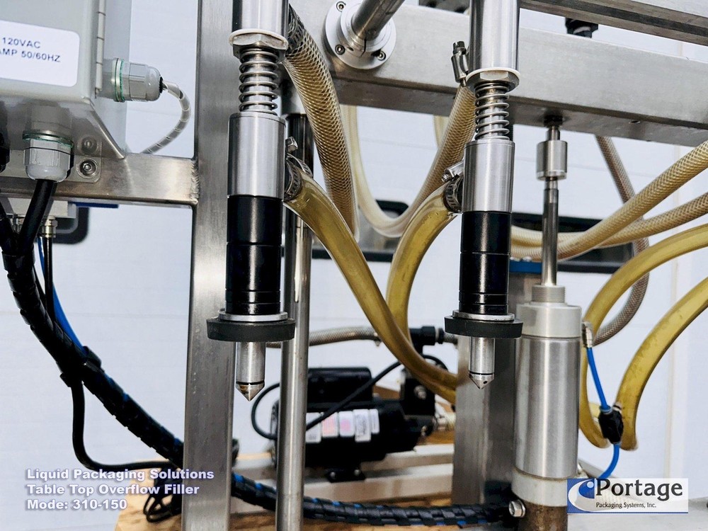 Liquid Packaging Solutions Model: 310-150 || Semi-Automatic Table Top Overflow