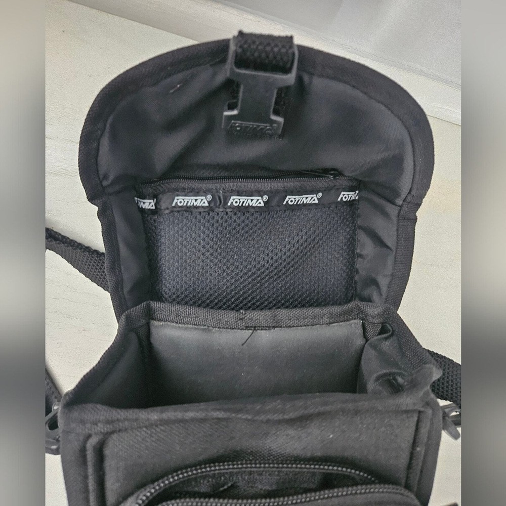 Fotima black camera carrying case model no. 60C with strap and pockets