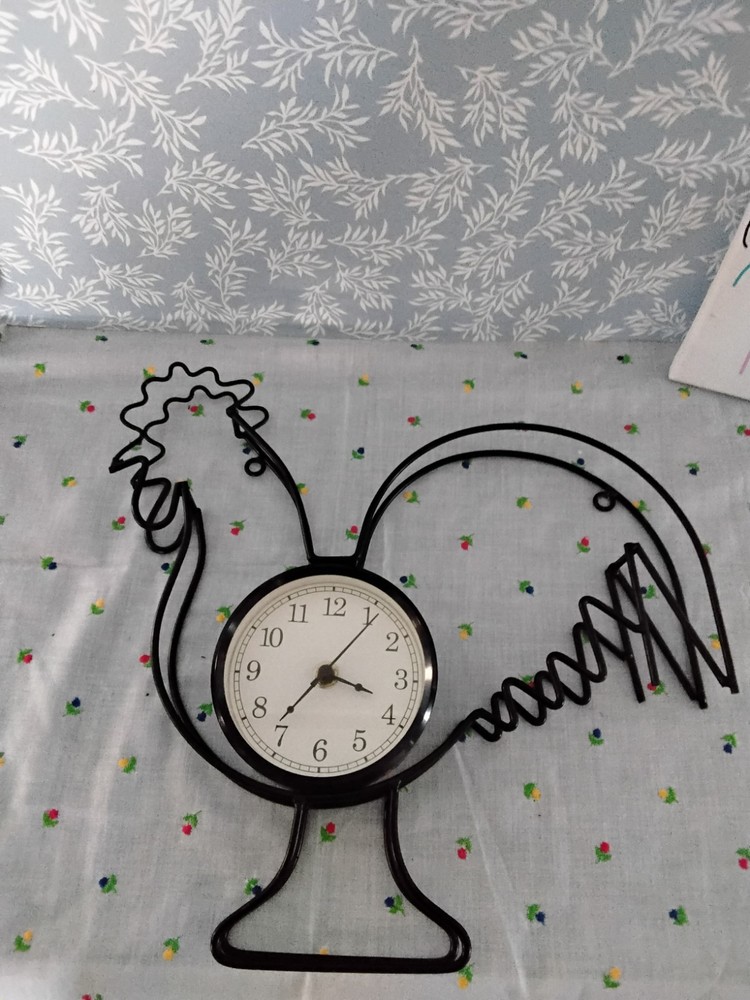 Black Metal Rooster-Shape Frame With Circular Clock Face .