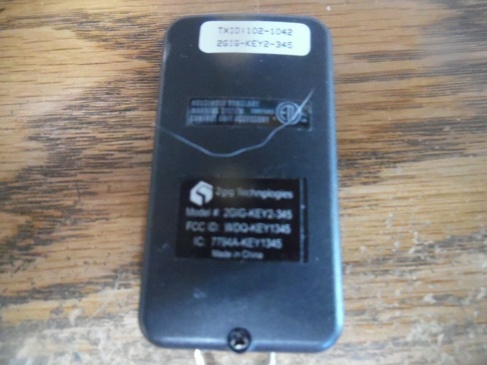 2 gig technologies burglar alarm system key remote. model:2gig-key2-345
