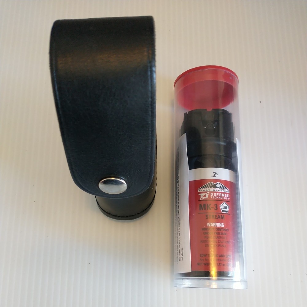 One (1) Defense Technology OC Stream MK-3 .2% Solution & Stallion Leather Holder