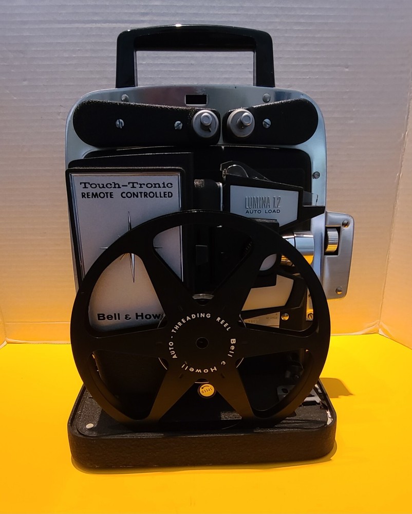 Bell and + Howell- Touch Tronic Lumina 1.2- Automatic Projector- Untested