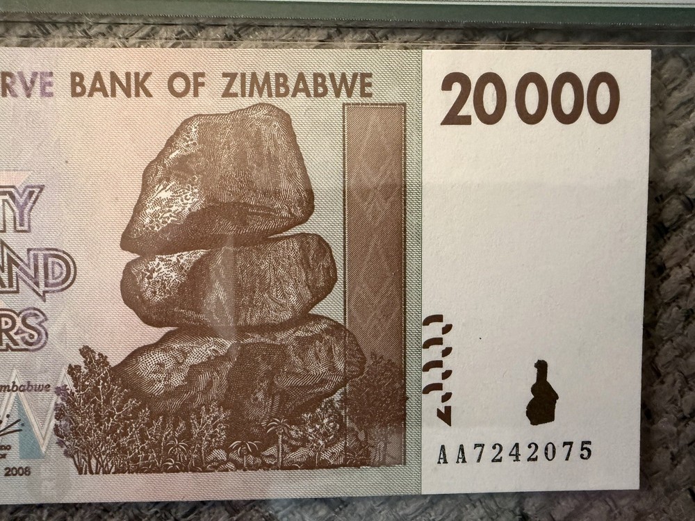 ✨ Zimbabwe 2008 20,000 Dollars — APMG Gem Uncirculated ✨