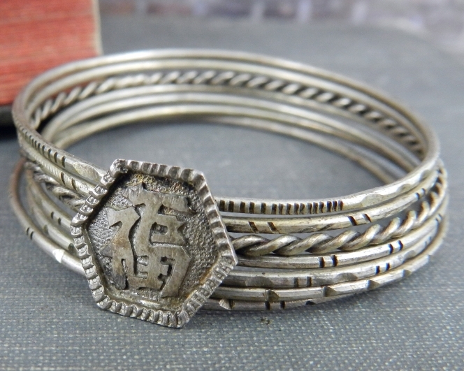 Asian Silver Multi Band Napkin Ring