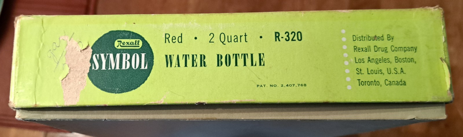 Vintage Rexall Symbol Red Rubber Water Bottle in Box