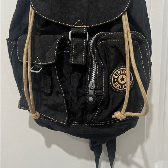 2003 Vintage Kipling Small Black Backpack with Tan Drawstrings