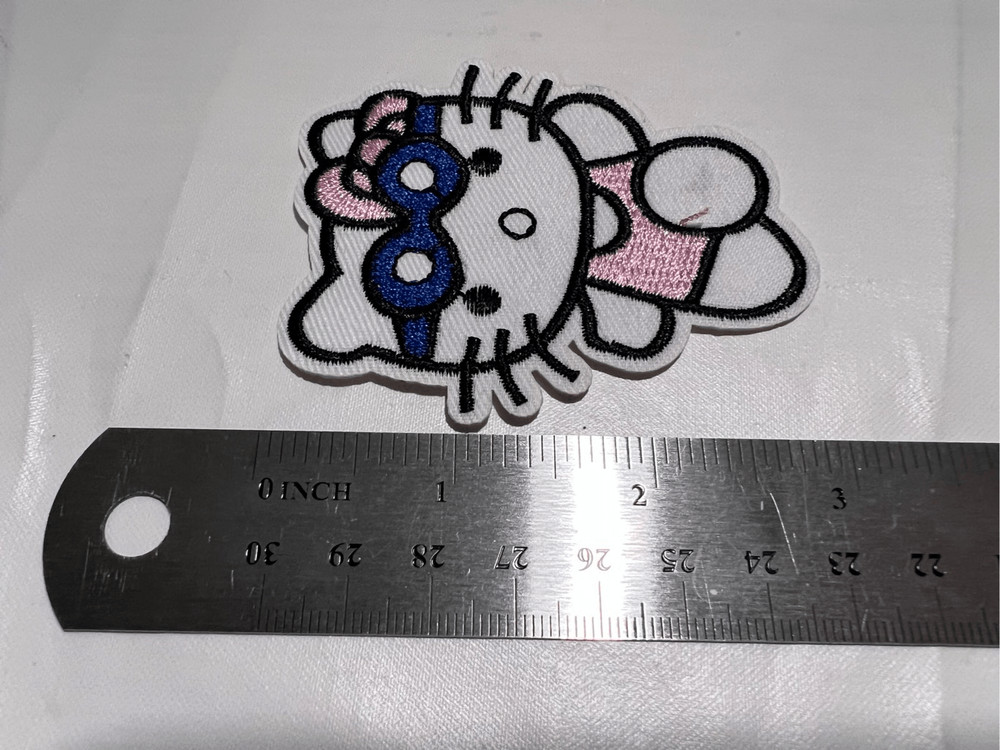 Hello Kitty in a Bathing Suit Iron on Patch