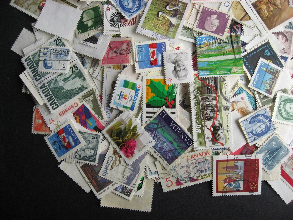 Canada colossal mixture (duplicates,mixed cond) 2000 laid out35%comems,65%defins