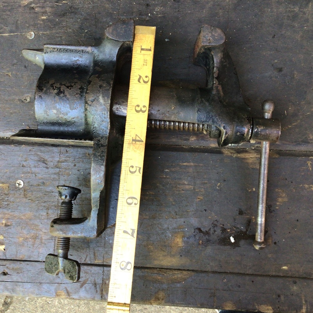 Small 2 1/2 “ Colton style clamp on bench vise. ￼