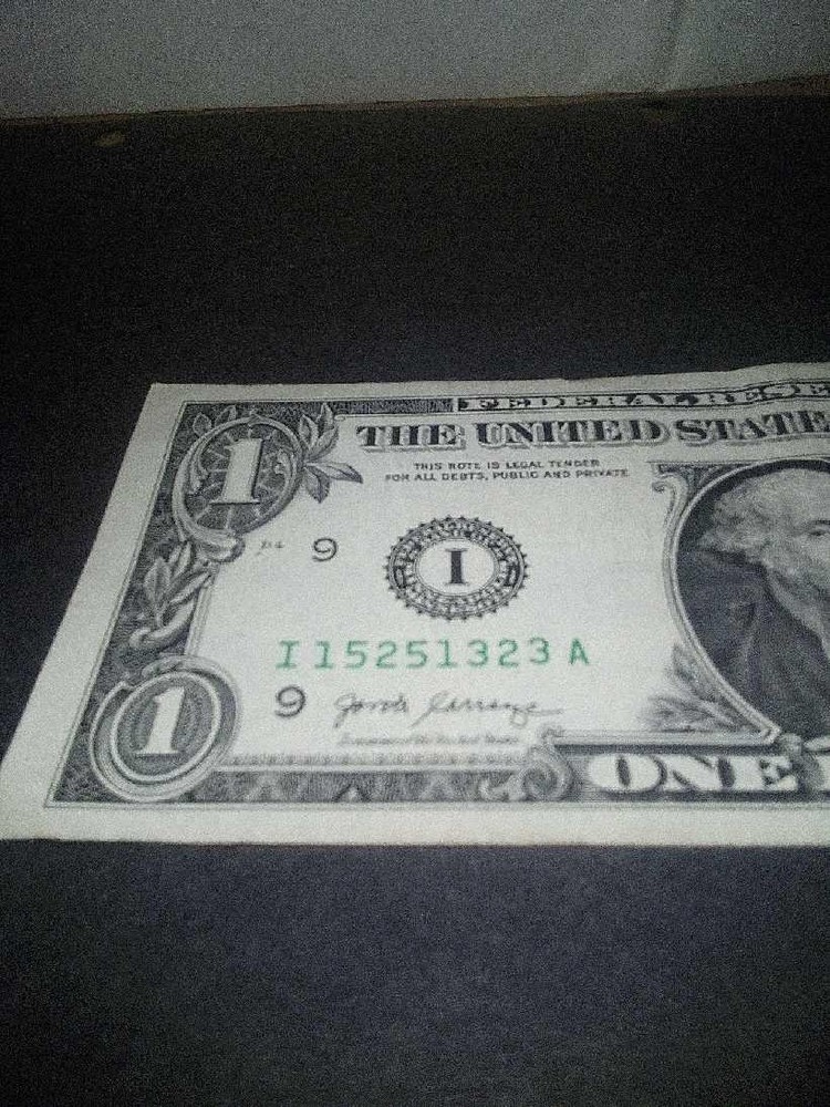 ERROR 1 DOLLAR BILLS, SLIGHT TEAR SEE PHOTO