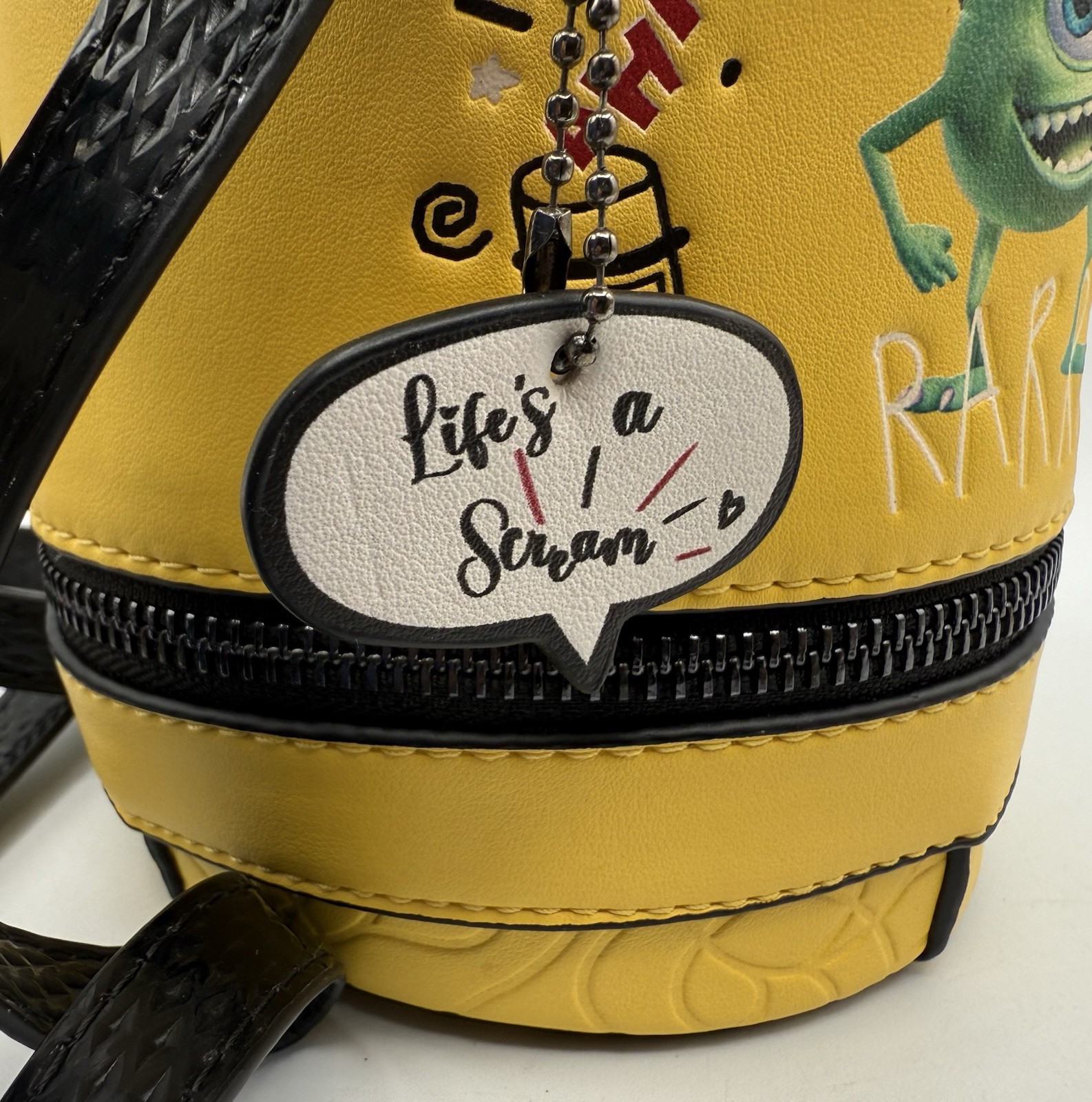 Danielle Nicole Pixar Monsters Inc Scream Laugh Canister Bag Crossbody Strap