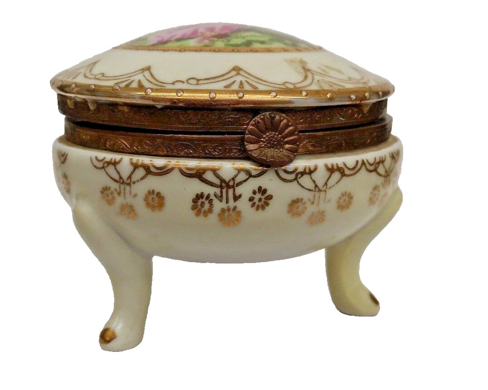 Porcelain trinket box shaped like a consul table