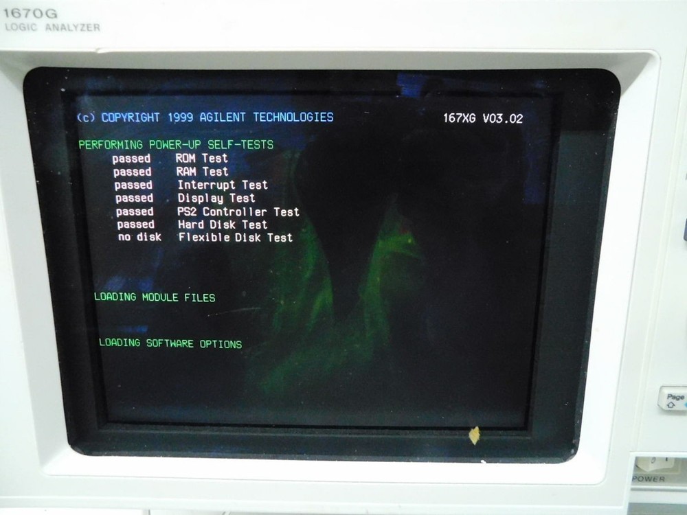 AGILENT 1670G LOGIC ANALYZER WITH CABLES. M7518