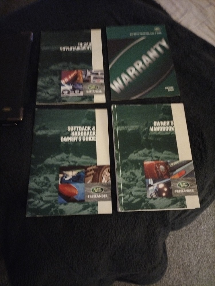 Land Rover Owners Guide Set.