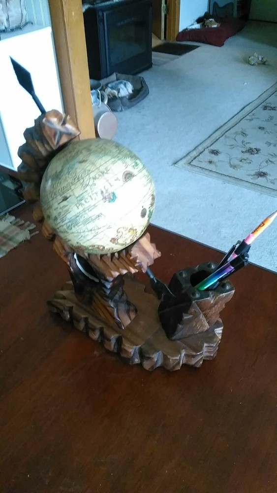 A Very Ornate Desktop Globe With Quartz Clock
