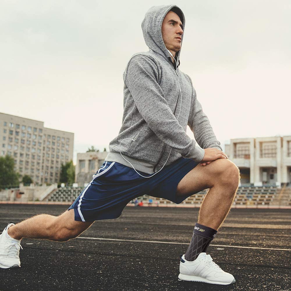 Spark Kinetic Ankle Sleeve - Compression Support with Embedded Kinesiology Tape