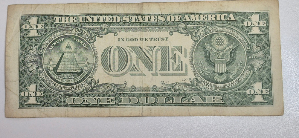 2013 One Dollar Note Over Inked Serial Number, "7"