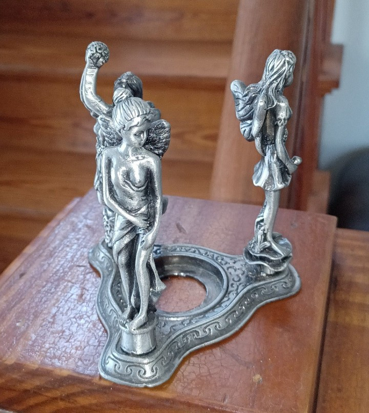 Metal 3 Character Pixie Tealight Holder.