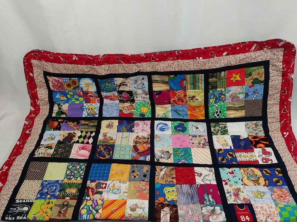 HANDMADE QUILT CHILDRENS  35”x52” multi character