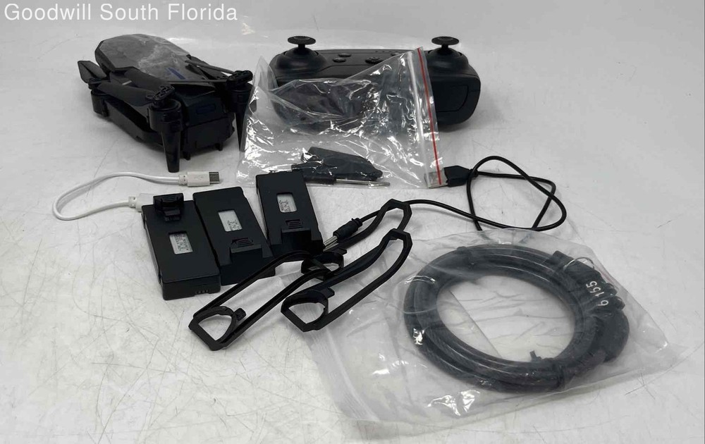 Black Remote Controller Drone With Accessories In Carrying Case No Tested