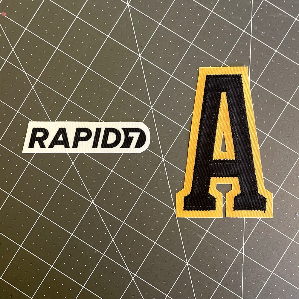 Boston Bruins Rapid7 + Alternate Captain A Fanatics white jersey patch bundle