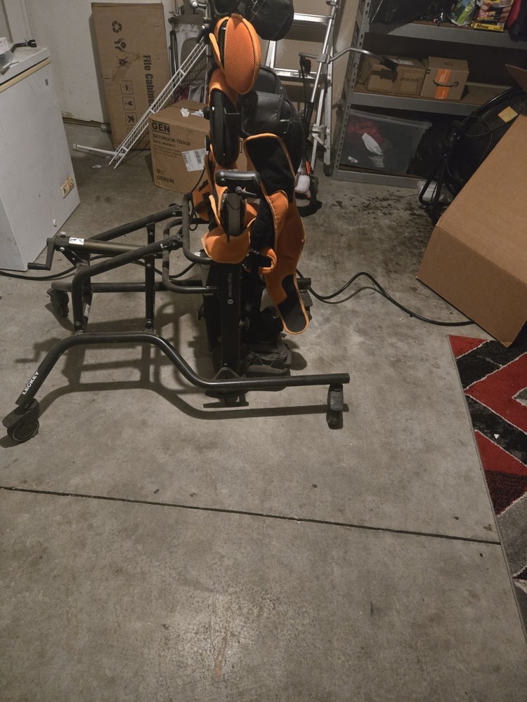 Leckey Movement Trainer Adjustable Height Backrest Orange Black Child 4-Wheel