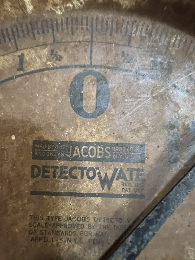 Antique rusty old hanging scale