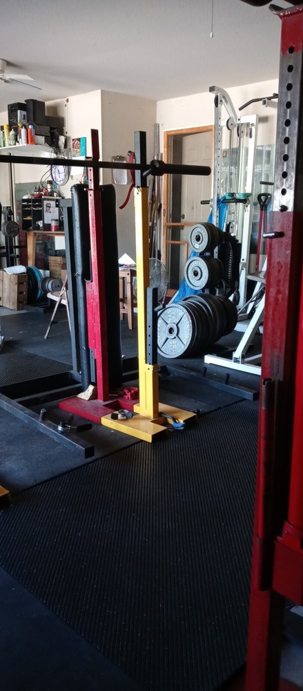 Used Pioneer adjustable open squat racks