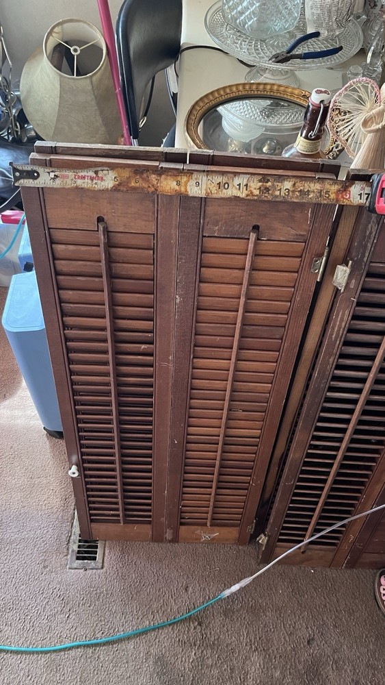 Vintage solid wood framed with hinges and knobs window shutters