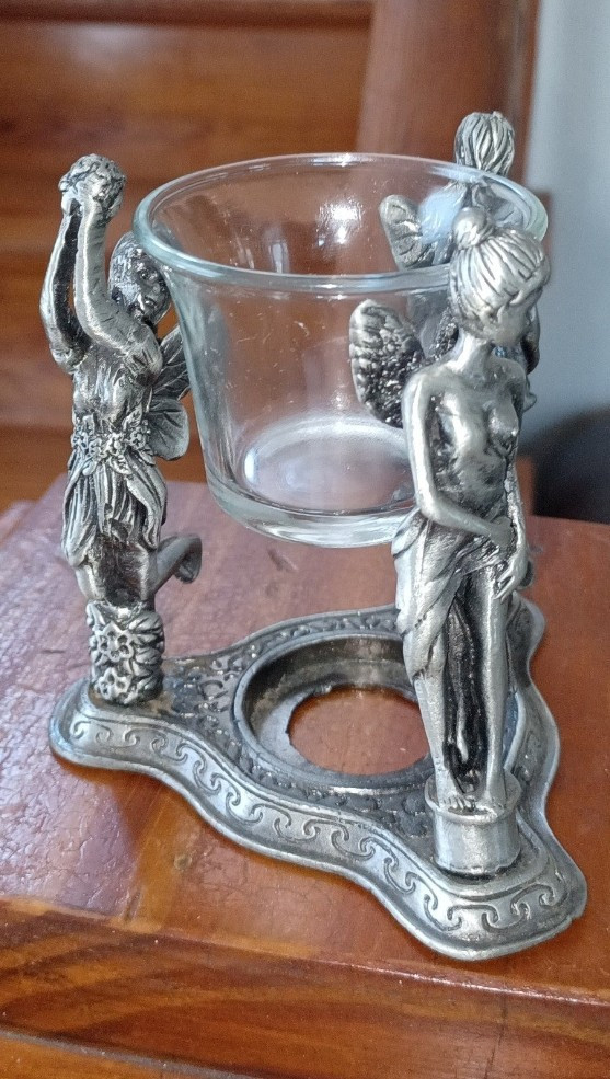 Metal 3 Character Pixie Tealight Holder.
