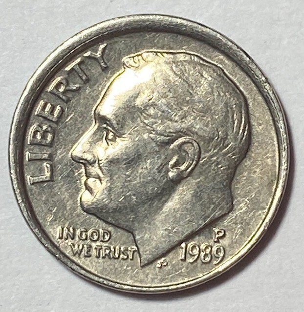 1989-P Roosevelt dime collar/rim error. 450